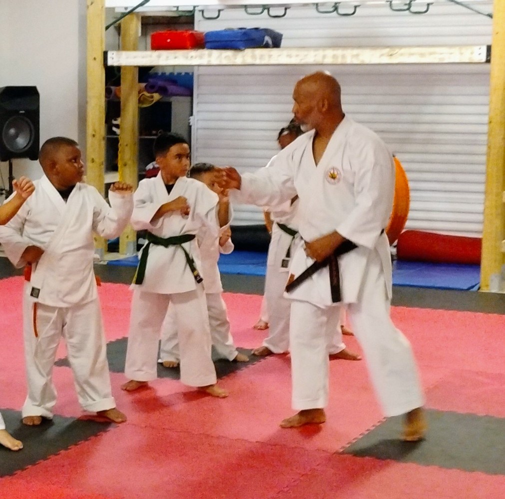 Sensei teaching kids